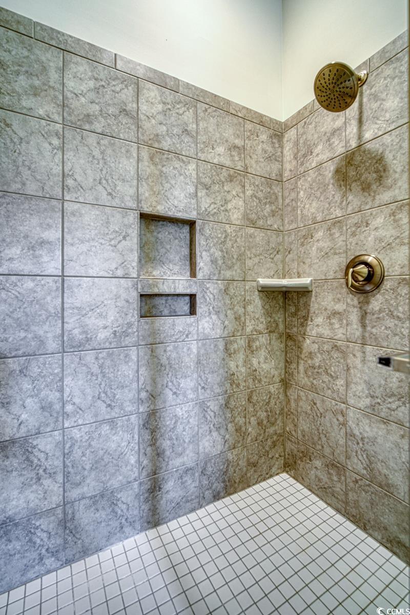 3810 Richardson Street Loris, SC 29569 - Photo 24 of 40 Full bathroom featuring tiled shower
