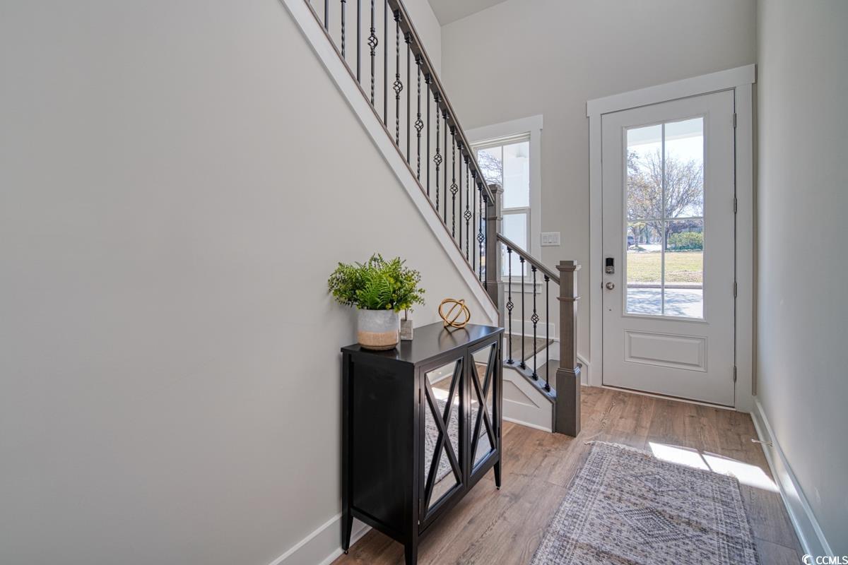 3810 Richardson Street Loris, SC 29569 - Photo 27 of 40 Foyer entrance featuring stairway and light wood finished floors