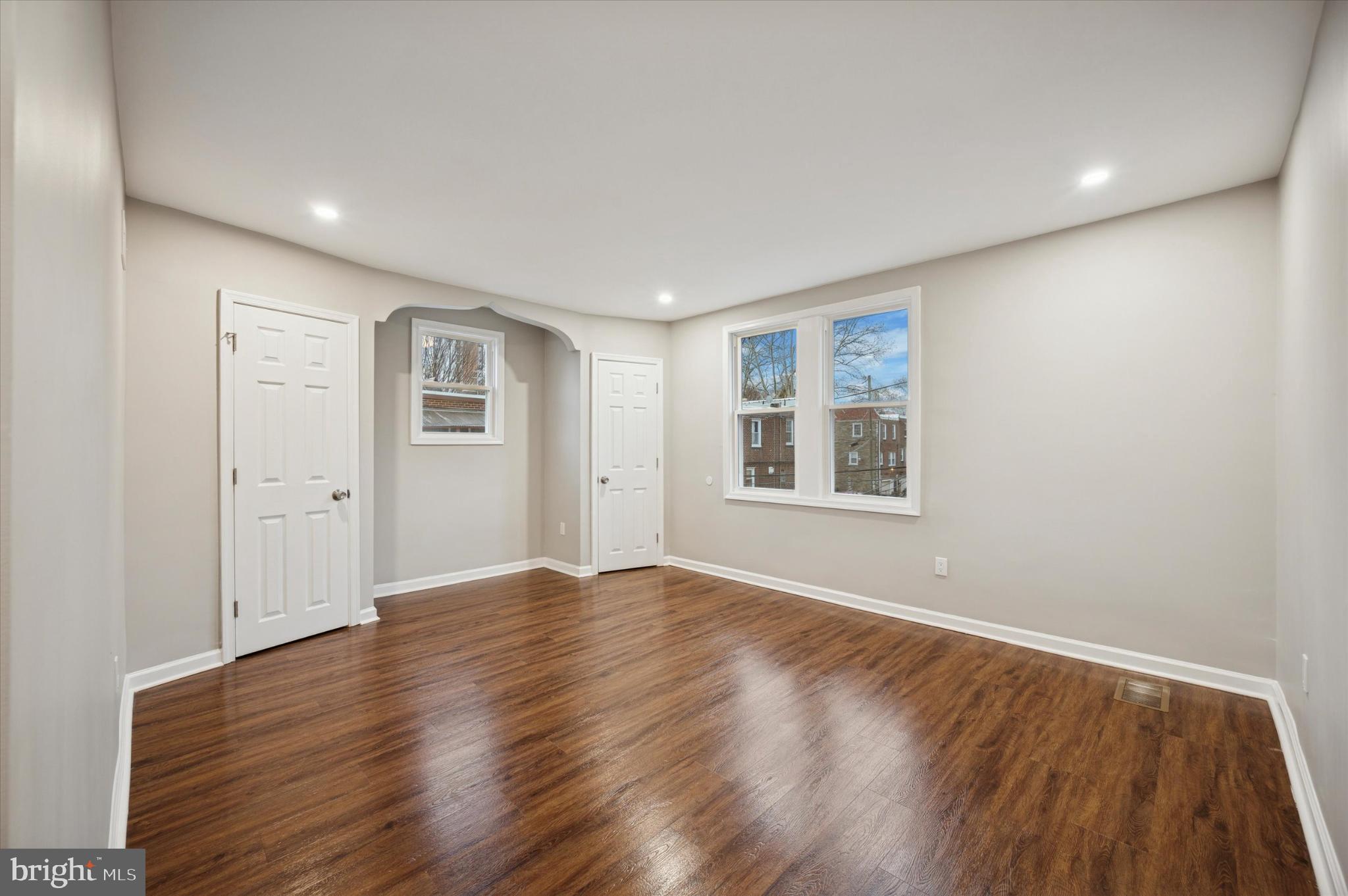 6416 North 15th Street Philadelphia, PA 19126 - Photo 11 of 23 a view of an empty room with window and wooden floor