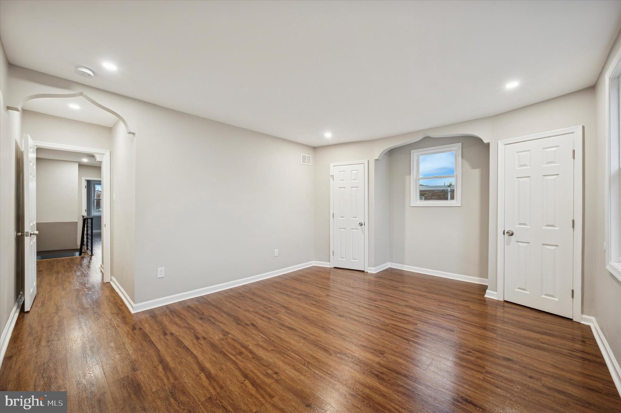 6416 North 15th Street Philadelphia, PA 19126 - Photo 12 of 23 wooden floor in an empty room with a window