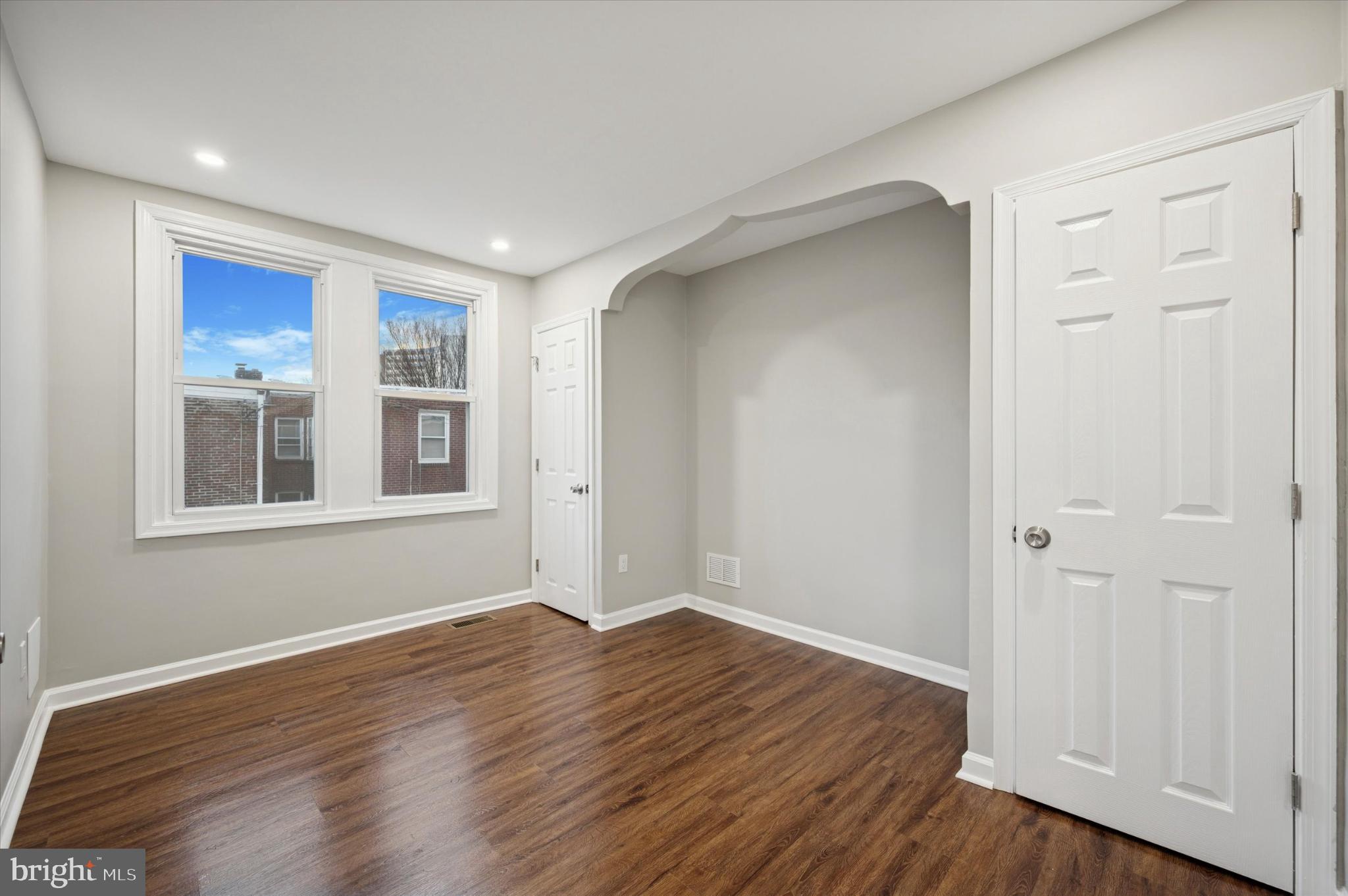 6416 North 15th Street Philadelphia, PA 19126 - Photo 13 of 23 a view of empty room with wooden floor and entryway