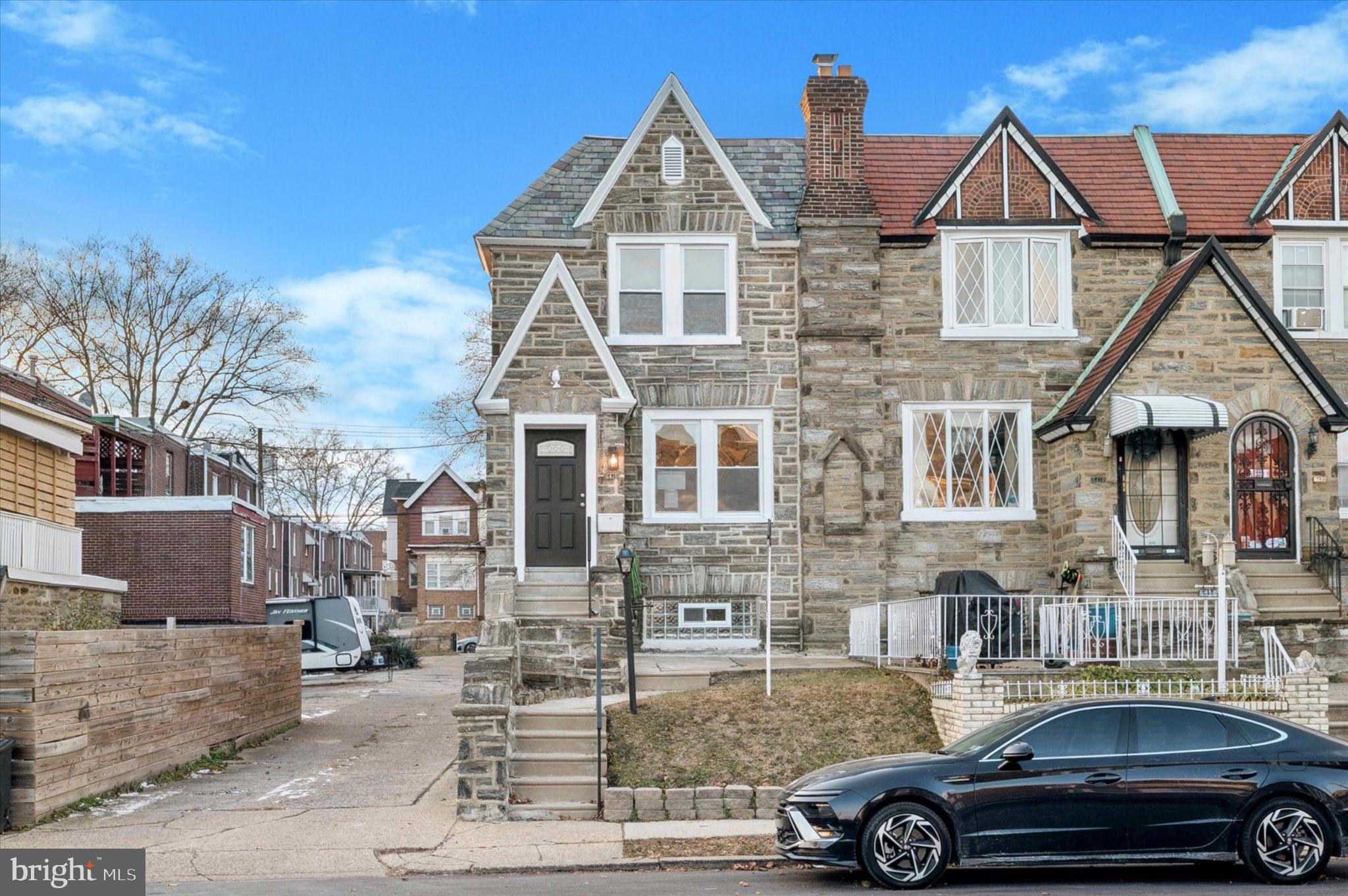 6416 North 15th Street Philadelphia, PA 19126 - Photo 2 of 23 a front view of a house with parking space