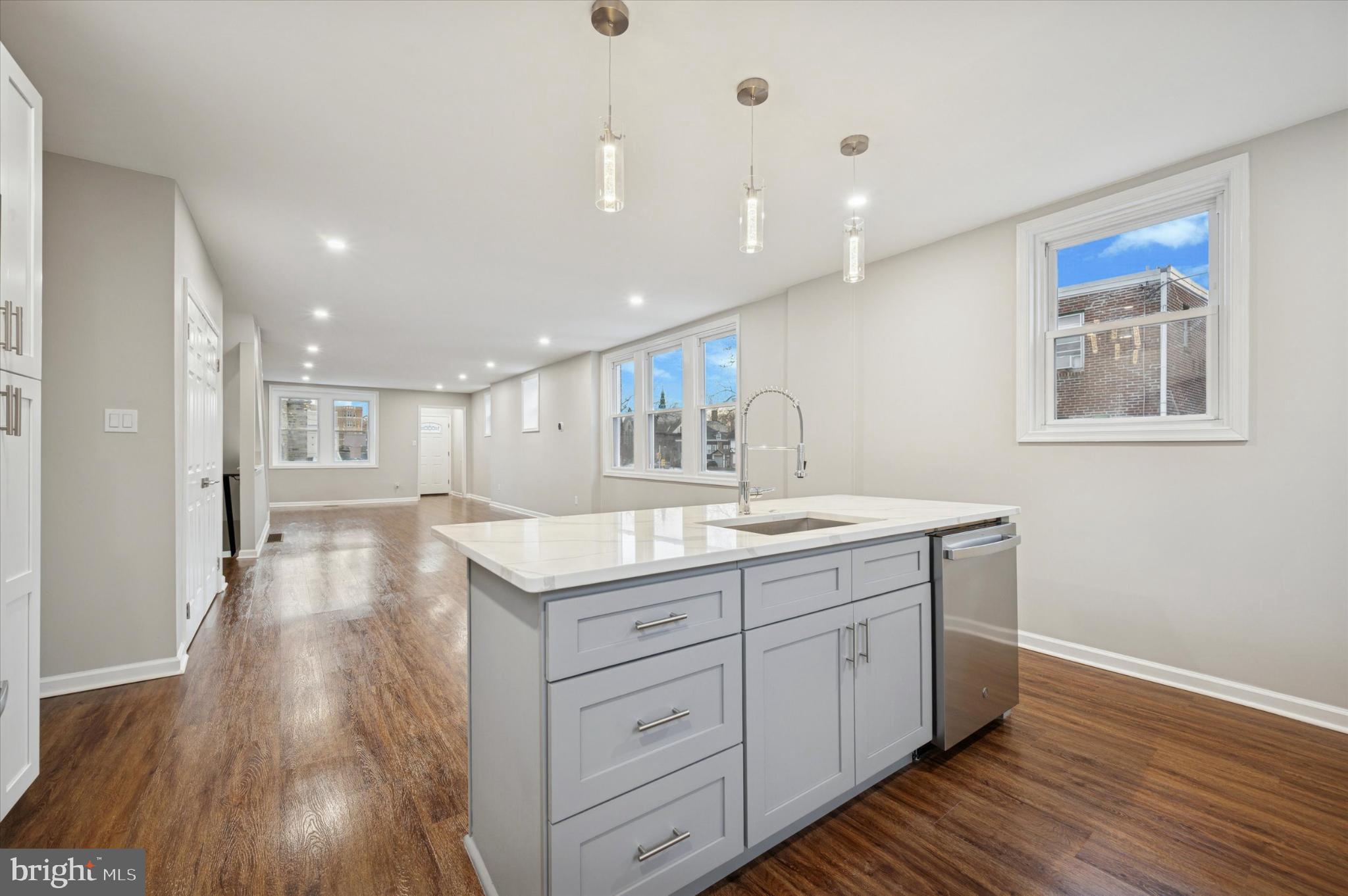 6416 North 15th Street Philadelphia, PA 19126 - Photo 10 of 23 a kitchen with a sink and wooden floor