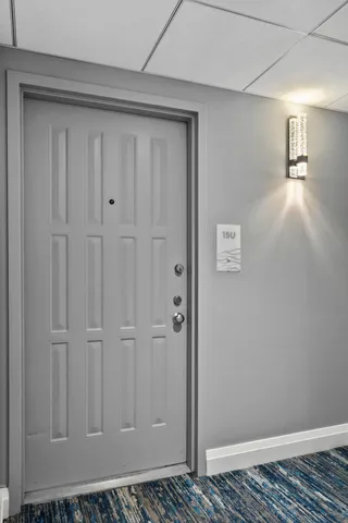 a picture of a bathroom with a mirror