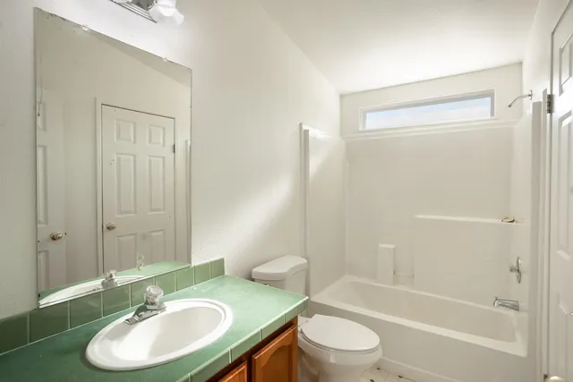 a view of a lake from a balcony