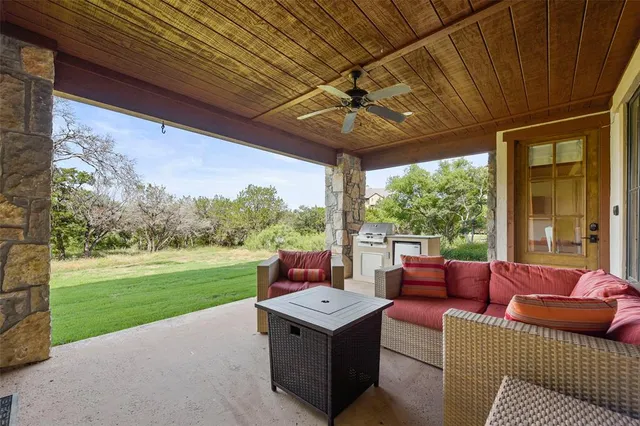 a outdoor living space with furniture and garden view