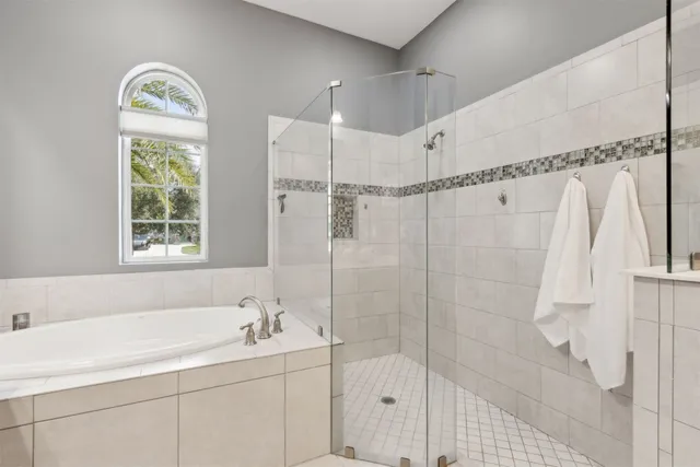 a bathroom with a sink double vanity and a mirror