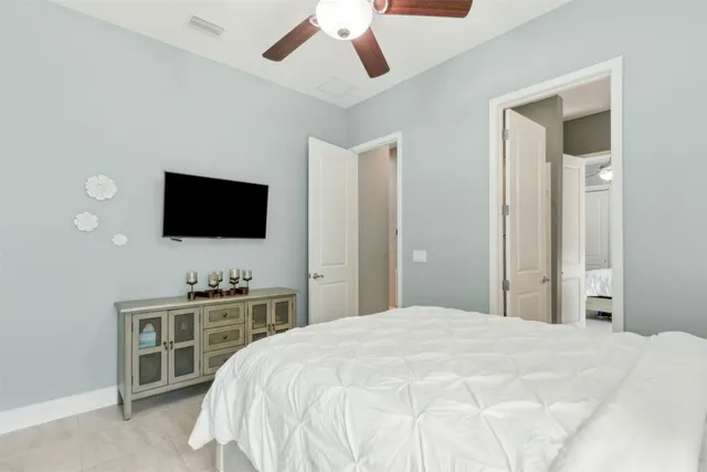 a view of a house with backyard and porch