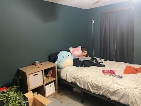 69 Ellis Road Southbridge, MA 01550 - Photo 3 of 8 a bedroom with a bed and a dresser