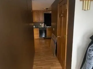 a view of a bathroom from the hallway