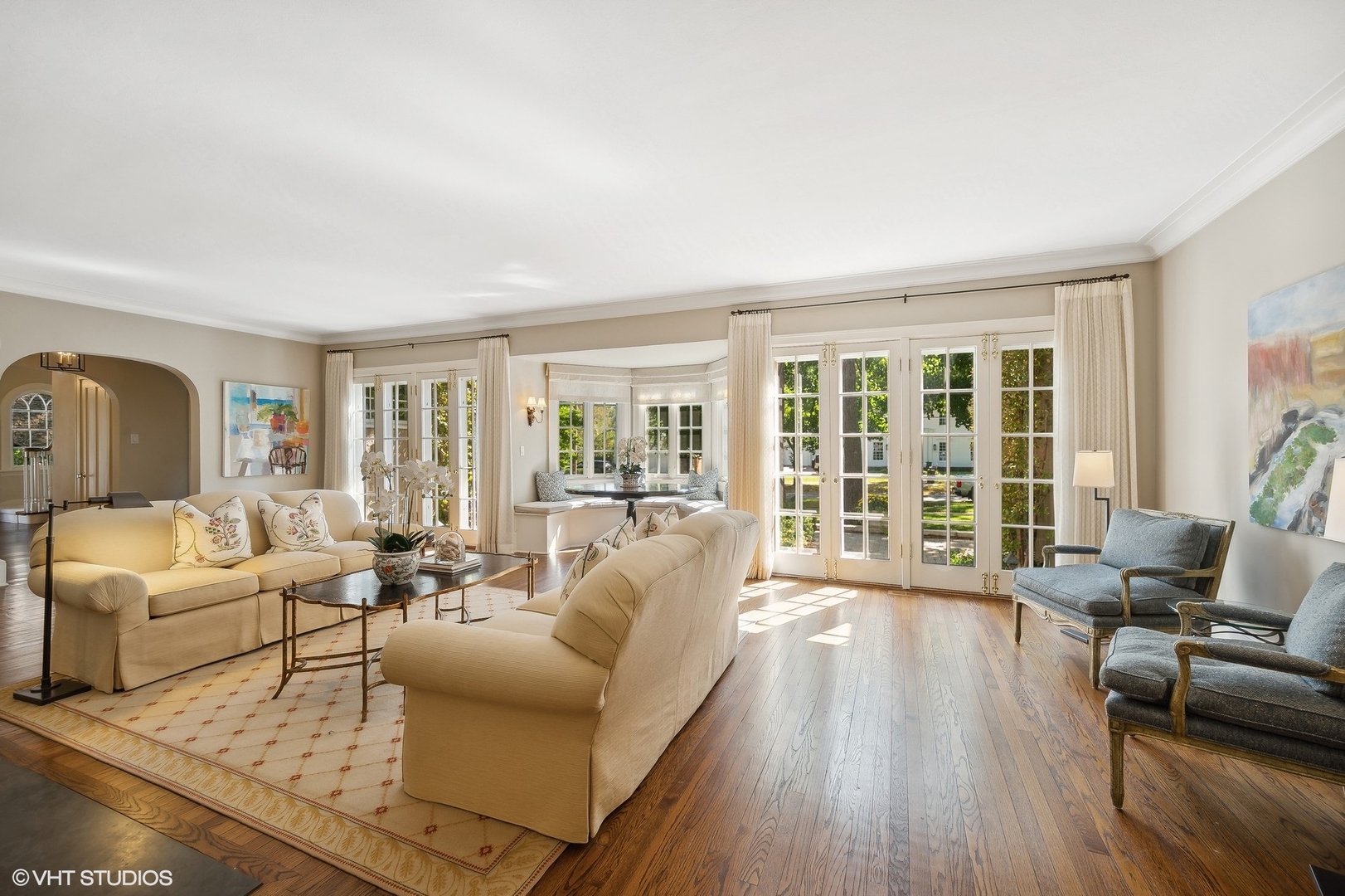 1015 Dinsmore Road Winnetka, IL 60093 - Photo 11 of 46 a living room with furniture and a large window