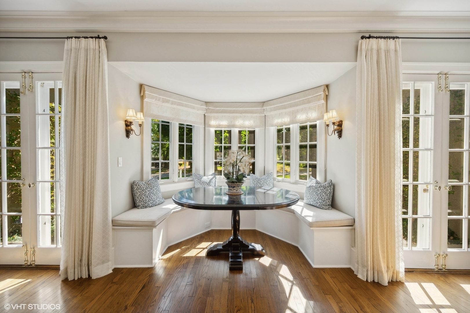 1015 Dinsmore Road Winnetka, IL 60093 - Photo 13 of 46 a living room with furniture and a chandelier