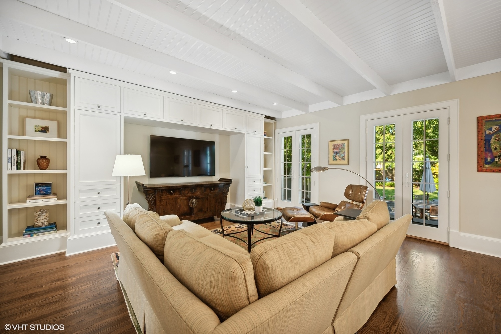 1015 Dinsmore Road Winnetka, IL 60093 - Photo 20 of 46 a living room with furniture and a flat screen tv