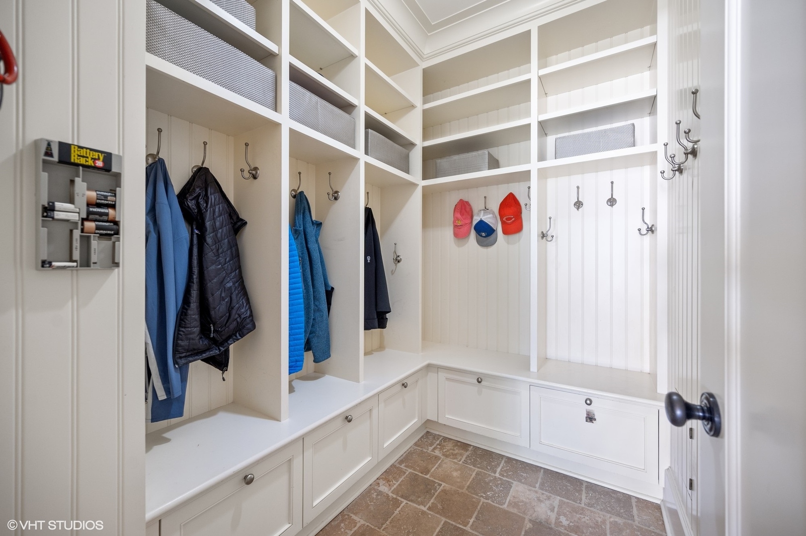 1015 Dinsmore Road Winnetka, IL 60093 - Photo 25 of 46 a view of walk in closet with clothes and shoes