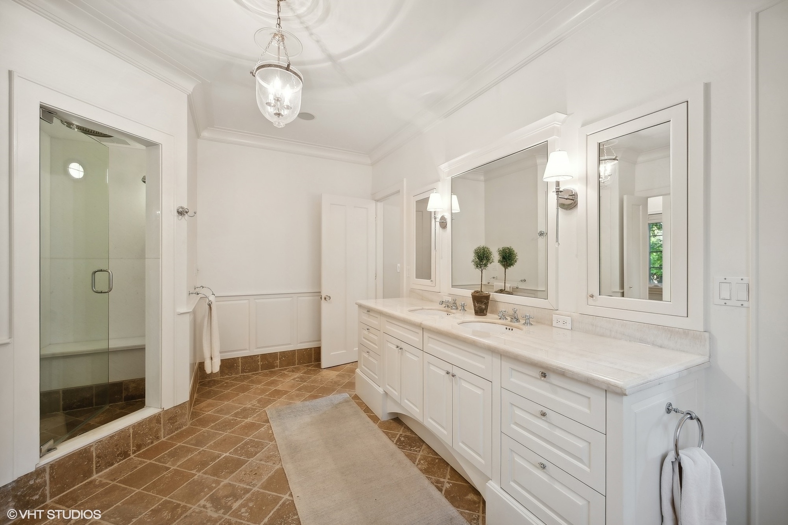 1015 Dinsmore Road Winnetka, IL 60093 - Photo 29 of 46 a spacious bathroom with a double vanity sink mirror and shower