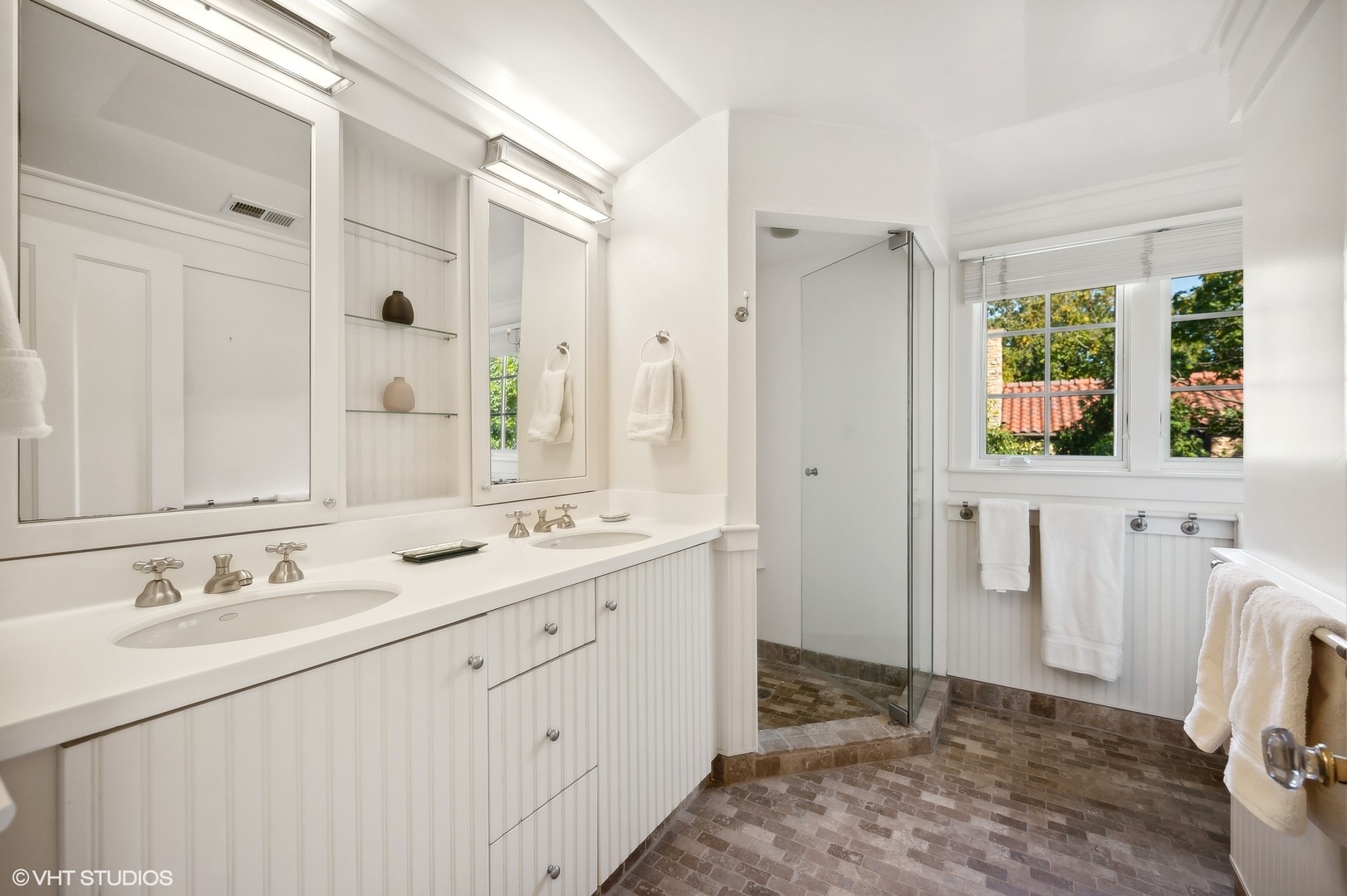 1015 Dinsmore Road Winnetka, IL 60093 - Photo 39 of 46 a bathroom with a double vanity sink and a mirror