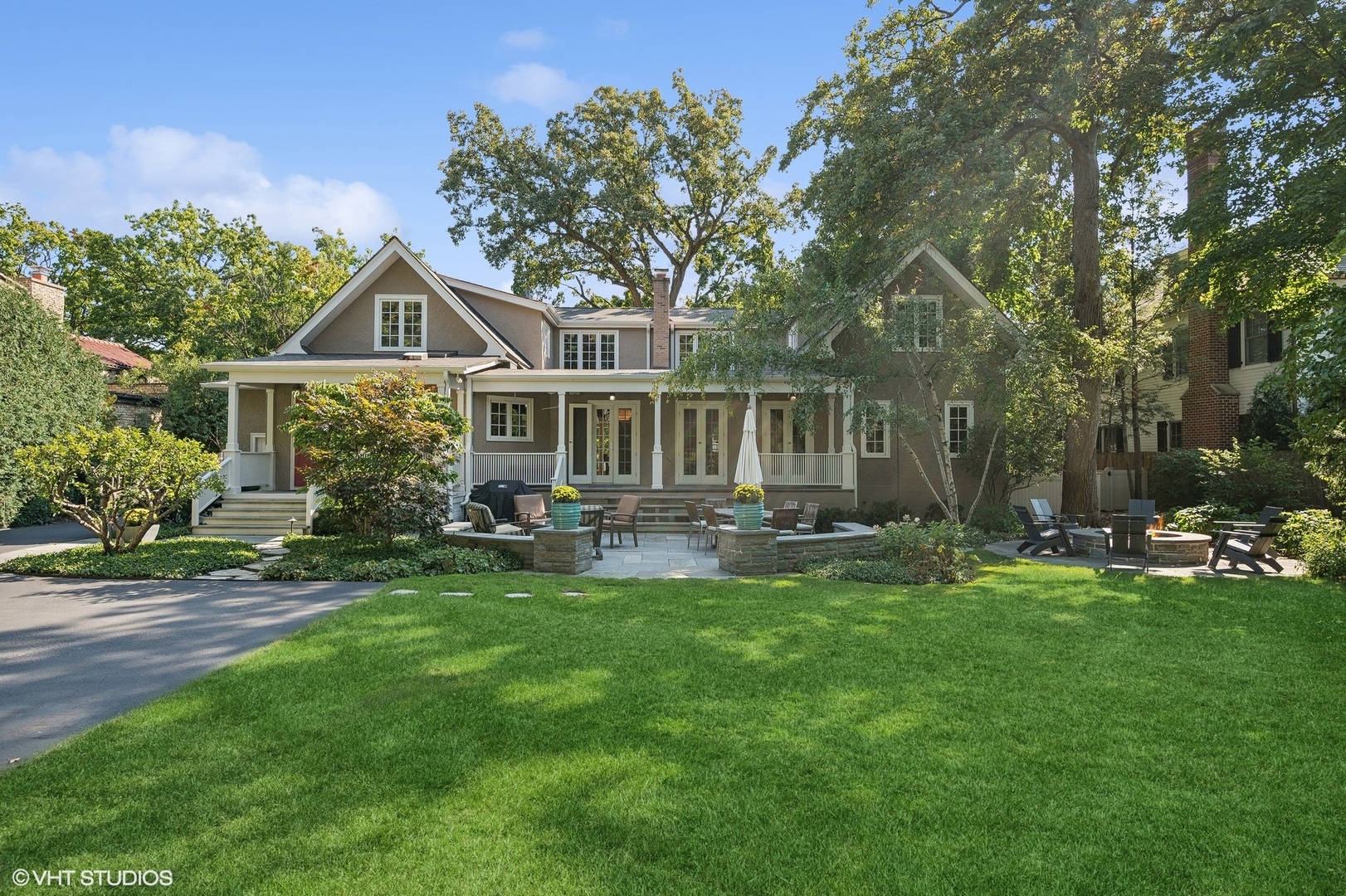 1015 Dinsmore Road Winnetka, IL 60093 - Photo 44 of 46 a front view of a house with swimming pool having outdoor seating