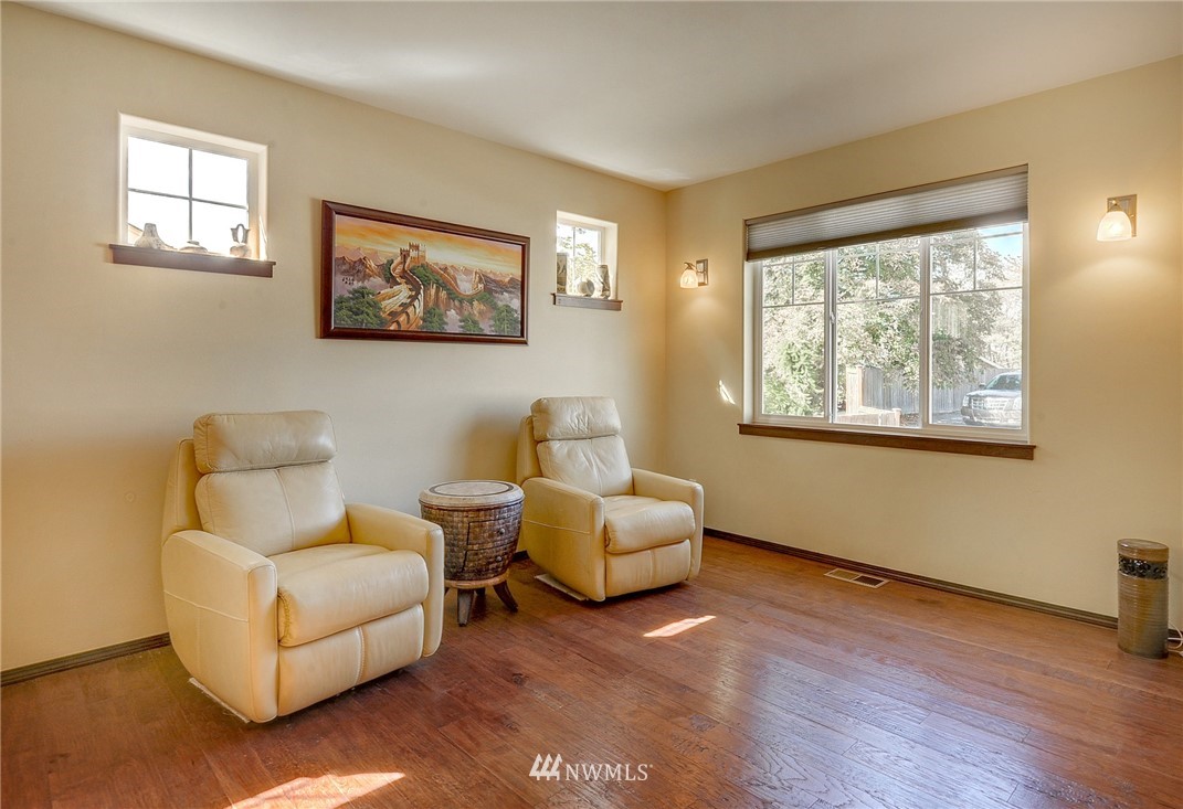 3424 189th Place Southeast Bothell, WA 98012 - Photo 3 of 16 a living room with furniture and a window
