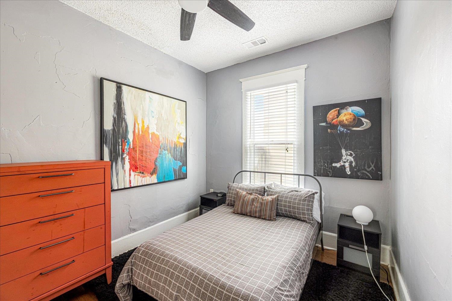 977 Philadelphia Street Memphis, TN 38104 - Photo 10 of 14 a bedroom with a bed and window