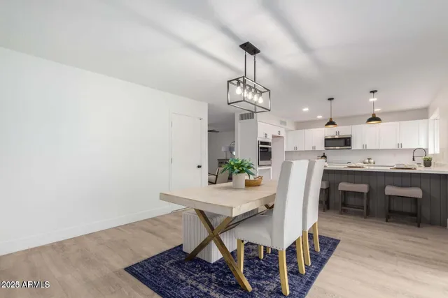 a view of a dining room with furniture