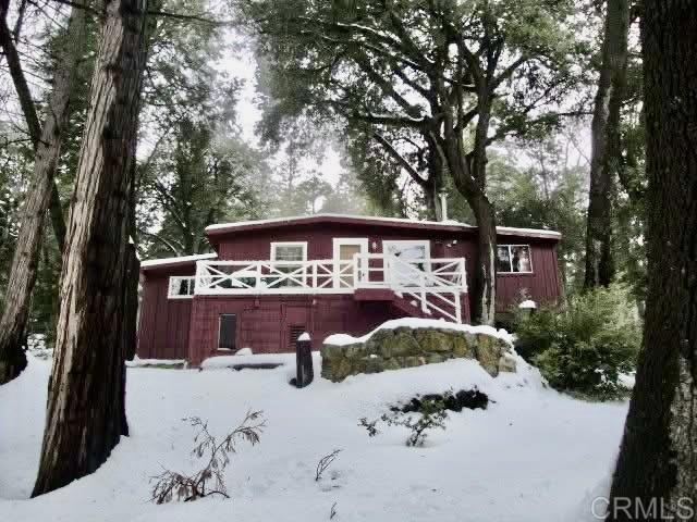 22292 Crestline Road Palomar Mountain, CA 92060 - Photo 6 of 38 a front view of a house with a yard