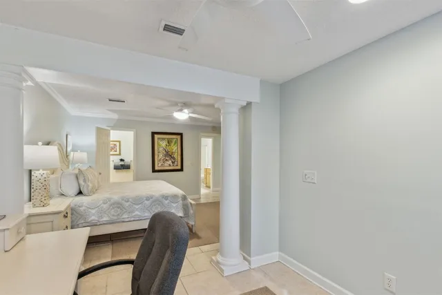 a bedroom with a bed and furniture