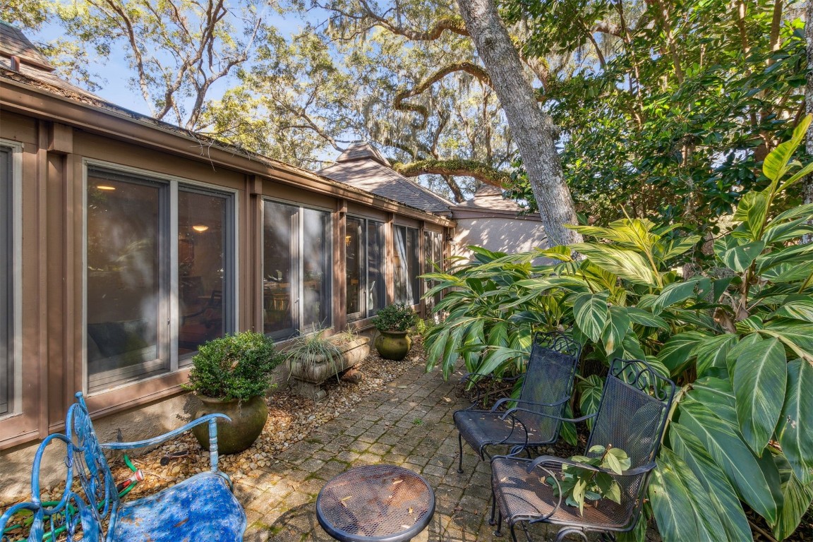 3323 Sea Marsh Road, Unit 3323 Fernandina Beach, FL 32034 - Photo 26 of 48 a backyard of a house with lots of green space