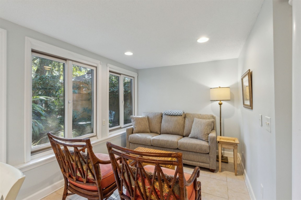 3323 Sea Marsh Road, Unit 3323 Fernandina Beach, FL 32034 - Photo 10 of 48 a living room with furniture and a window
