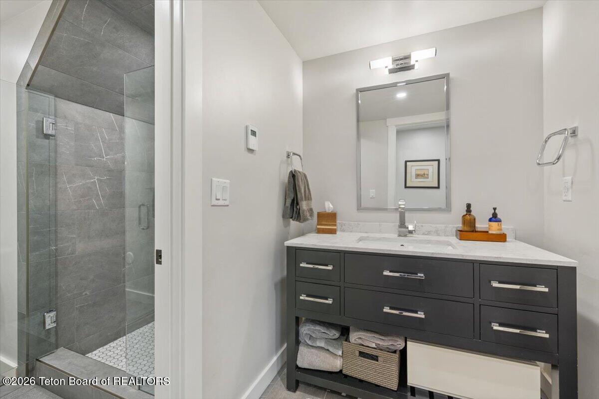 14270 Wagon Road Jackson, WY 83001 - Photo 26 of 29 Downstairs Guest Bathroom