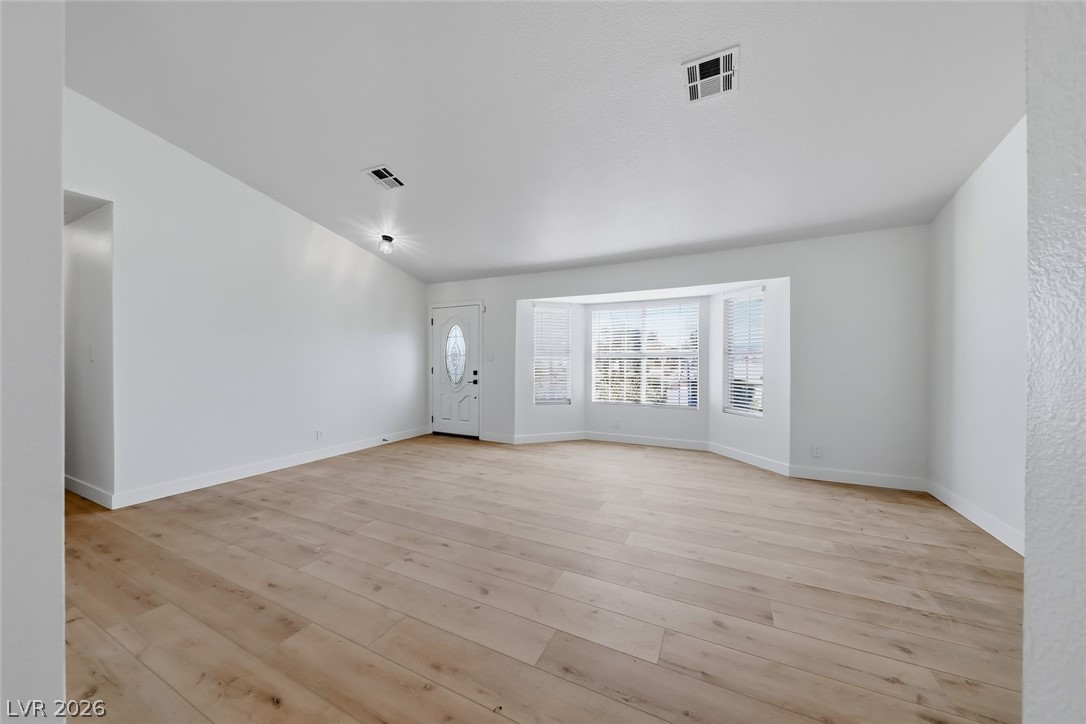 434 Crestway Road Henderson, NV 89015 - Photo 13 of 46 Spare room with light wood-type flooring and baseboards