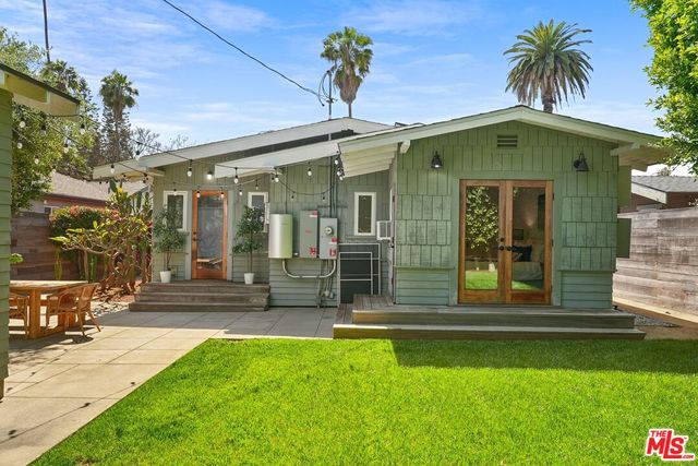 a view of a house with a swimming pool