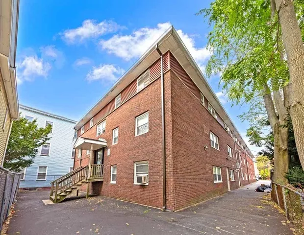 a view of a house with a street
