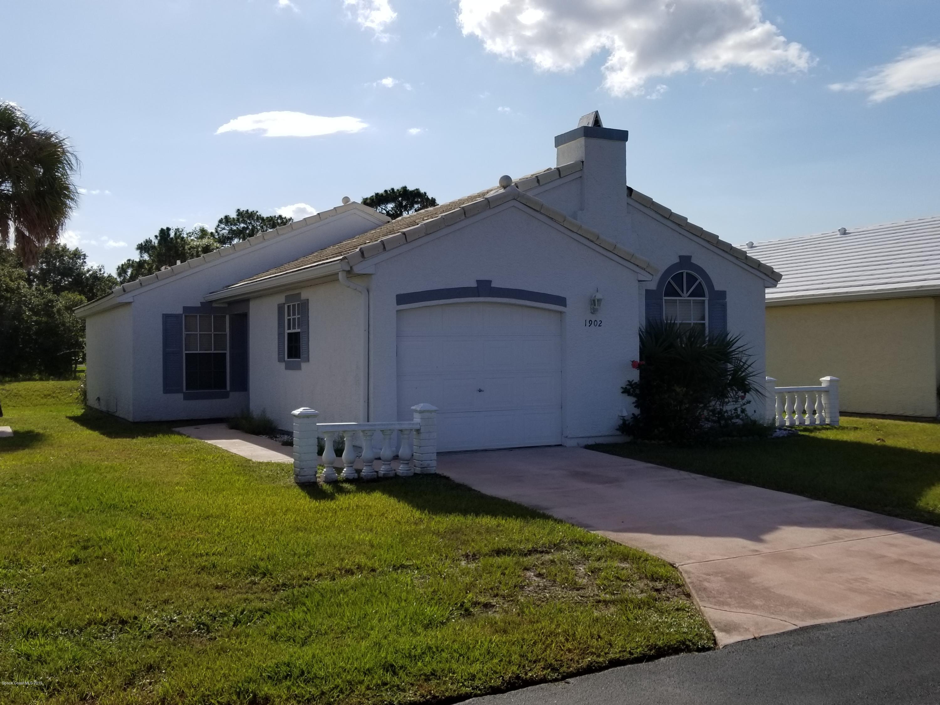 1902 Tallowood Court Northeast Palm Bay, FL 32905 - Photo 2 of 16 20190602_172452