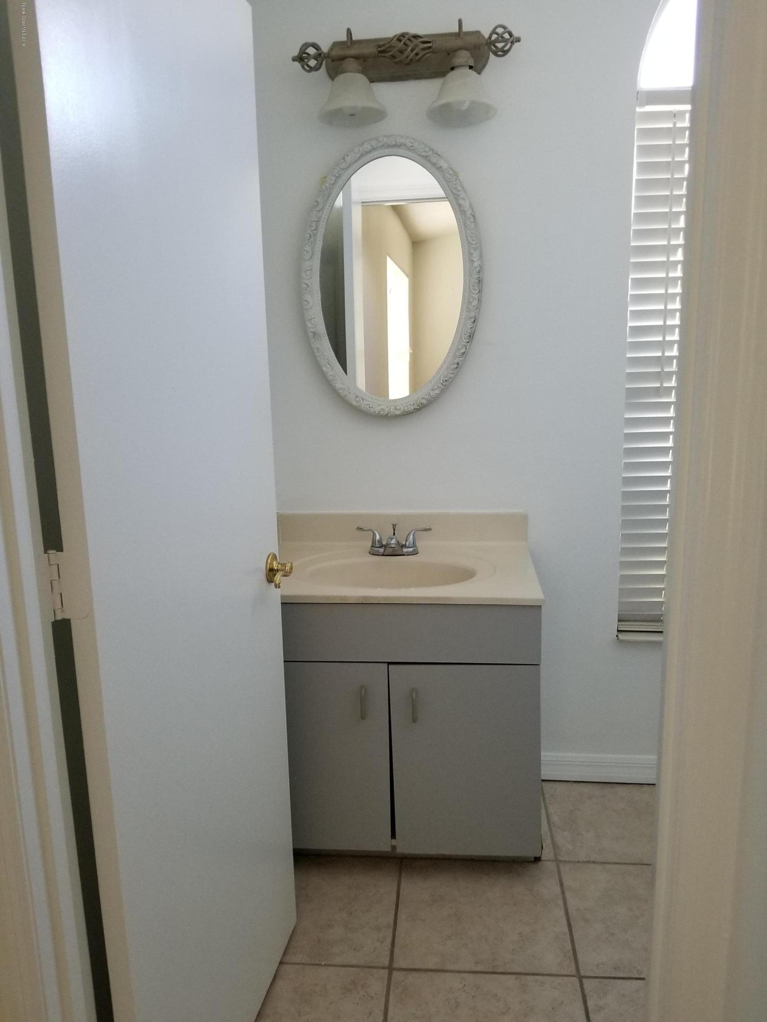 1902 Tallowood Court Northeast Palm Bay, FL 32905 - Photo 11 of 16 20190602_172633