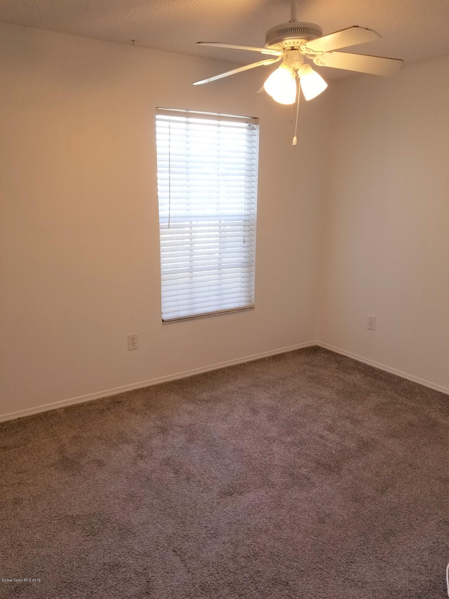 1902 Tallowood Court Northeast Palm Bay, FL 32905 - Photo 13 of 16 20190602_172754