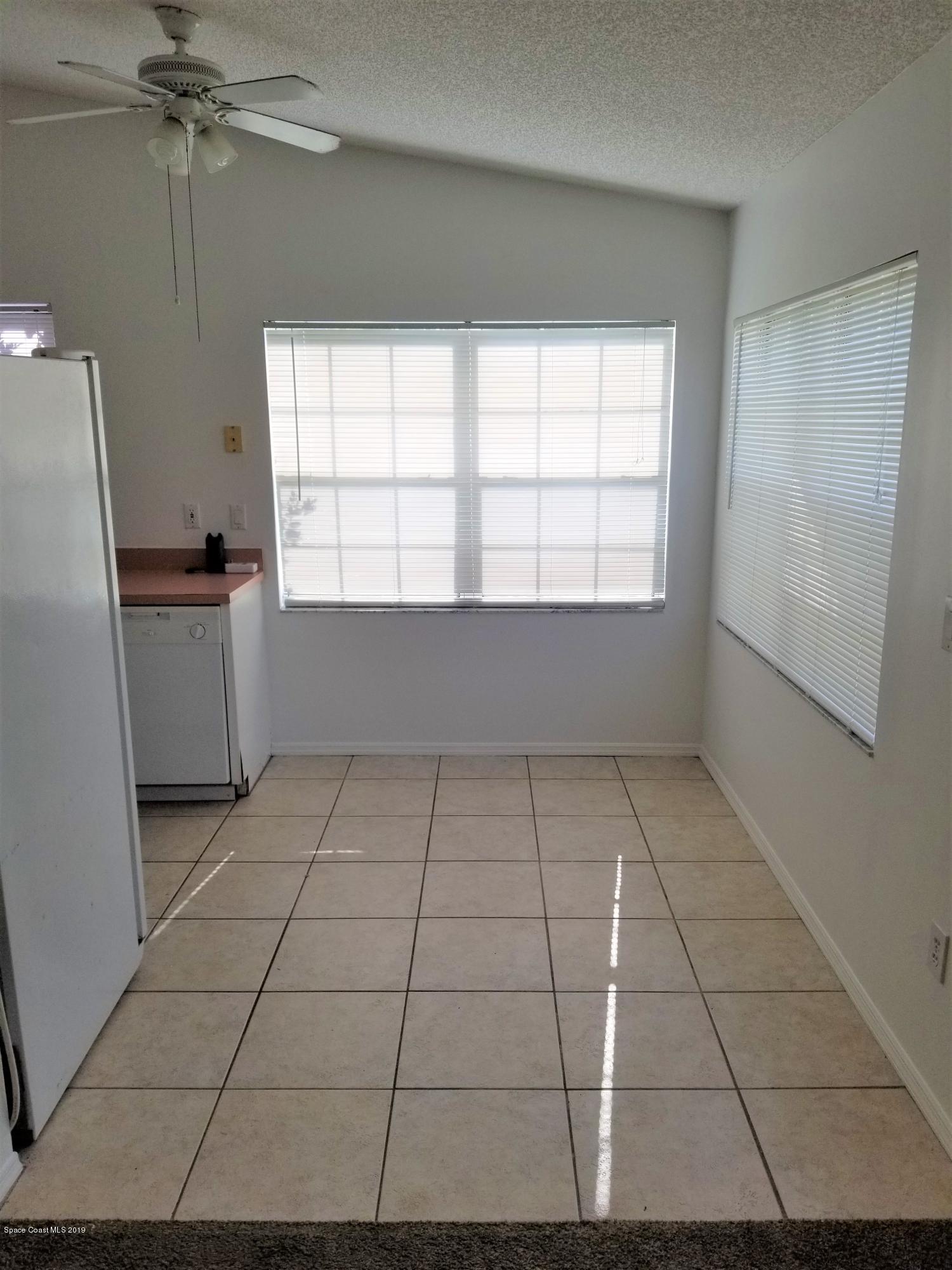 1902 Tallowood Court Northeast Palm Bay, FL 32905 - Photo 6 of 16 20190602_172949