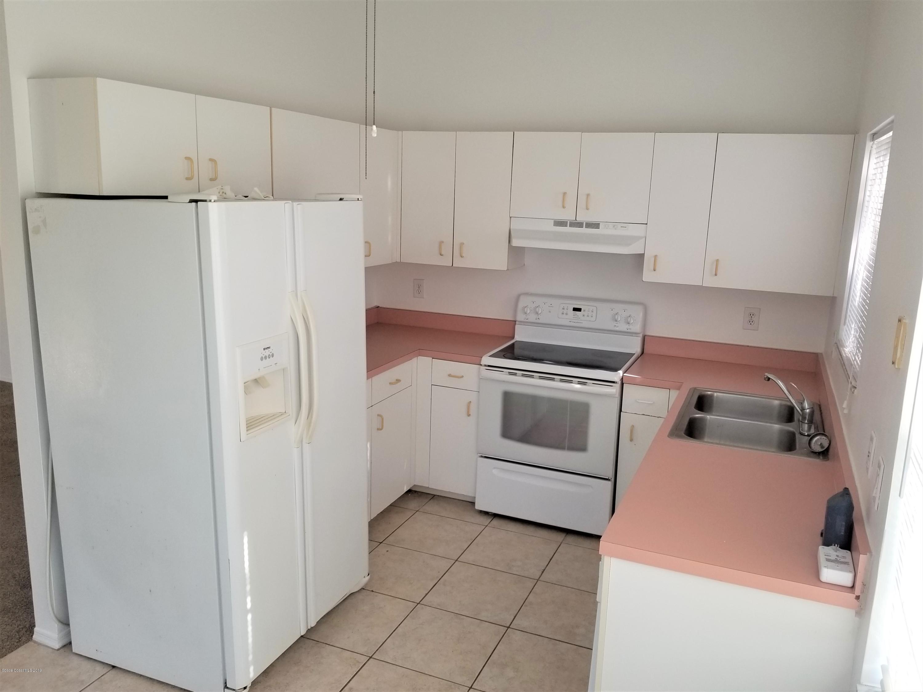 1902 Tallowood Court Northeast Palm Bay, FL 32905 - Photo 7 of 16 20190602_173003