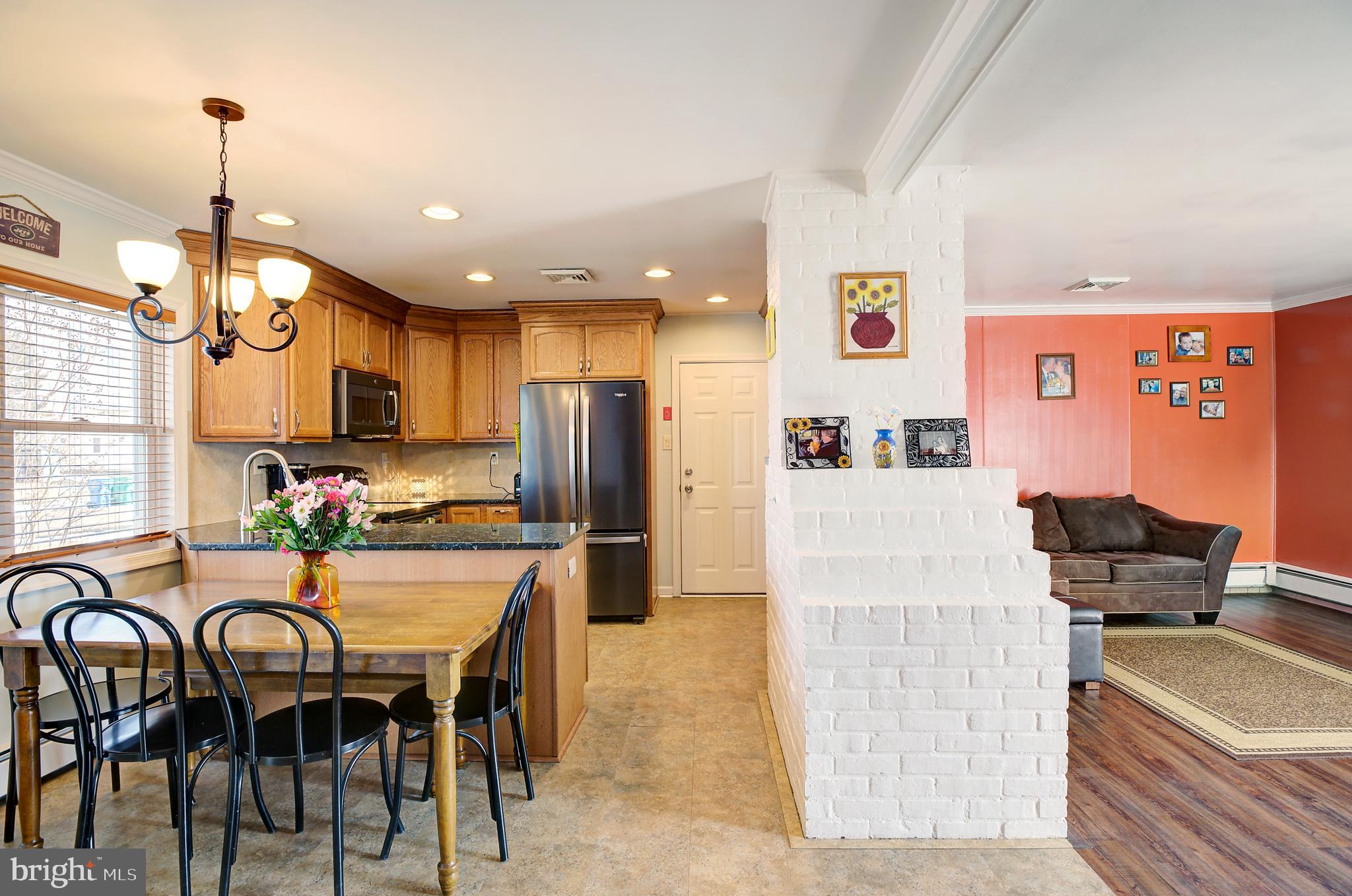 69 Gaping Rock Road Levittown, PA 19057 - Photo 5 of 21 Kitchen and Living Room