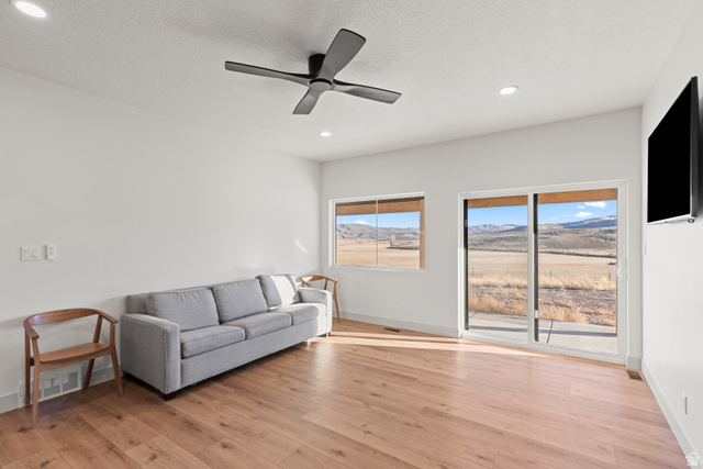 2920 West Temple Cyn Road Laketown, UT 84038 - Photo 48 of 69 AUD open concept living room and kitchen.