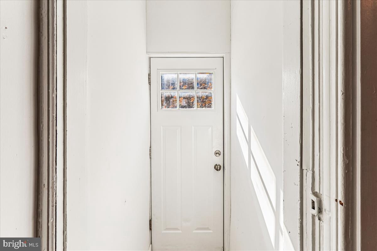 2023 Division Street Baltimore, MD 21217 - Photo 2 of 35 a picture of a glass window