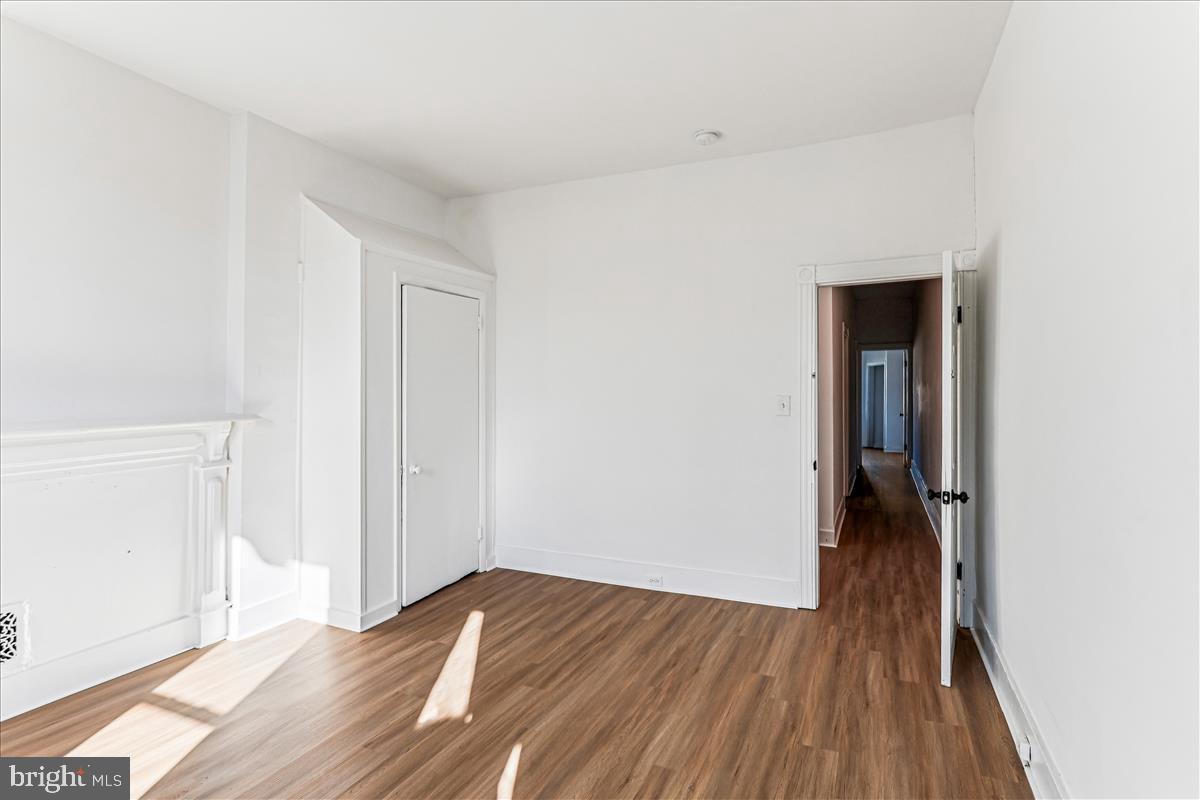 2023 Division Street Baltimore, MD 21217 - Photo 22 of 35 a view of a room with wooden floor