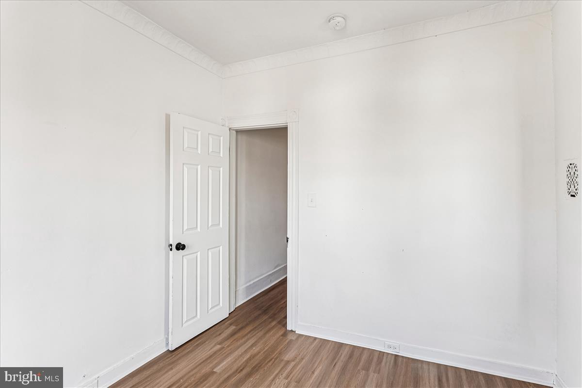 2023 Division Street Baltimore, MD 21217 - Photo 31 of 35 a view of a hallway with wooden floor