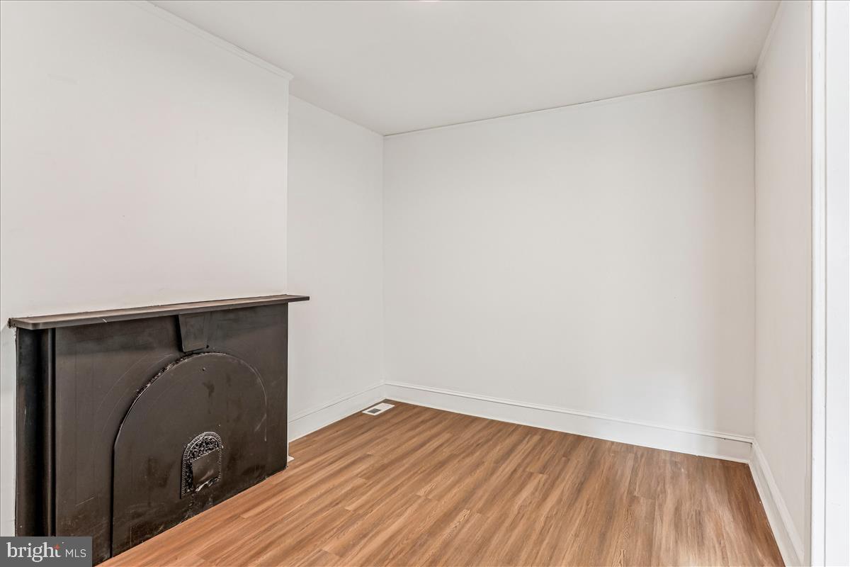 2023 Division Street Baltimore, MD 21217 - Photo 4 of 35 a view of a car with wooden floor