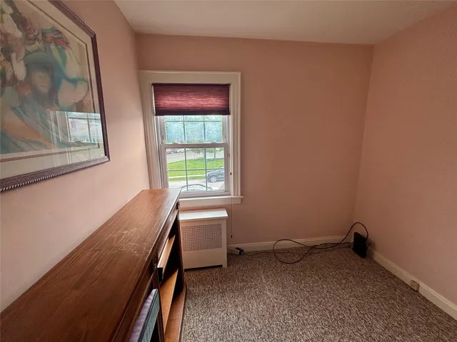 a view of a room with a window