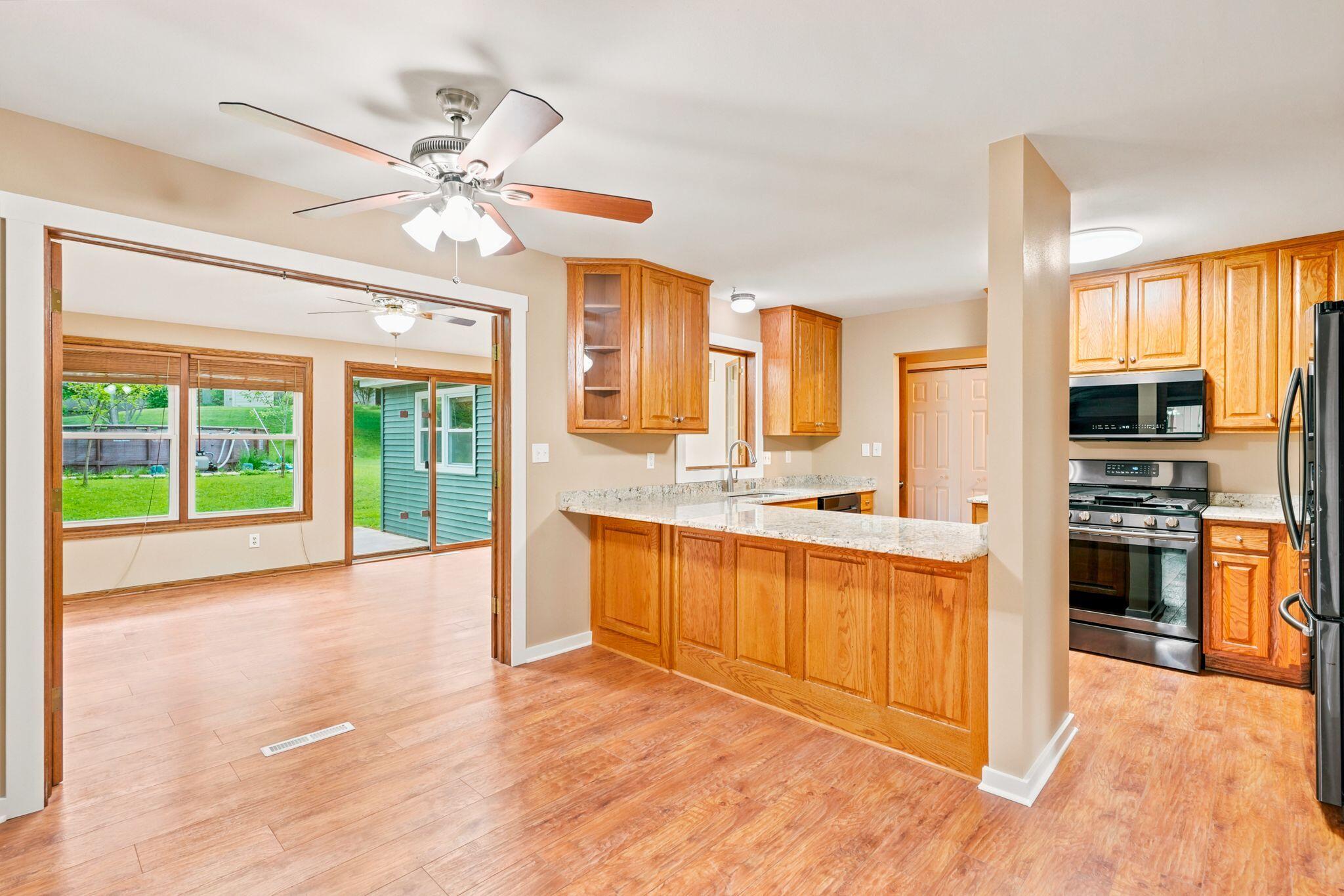 3971 South 118th Street Greenfield, WI 53228 - Photo 11 of 53 Kitchen - Sunroom