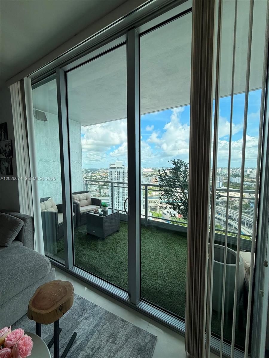 90 Southwest 3rd Street, Unit 4006 Miami, FL 33130 - Photo 2 of 19 a view of a room and balcony