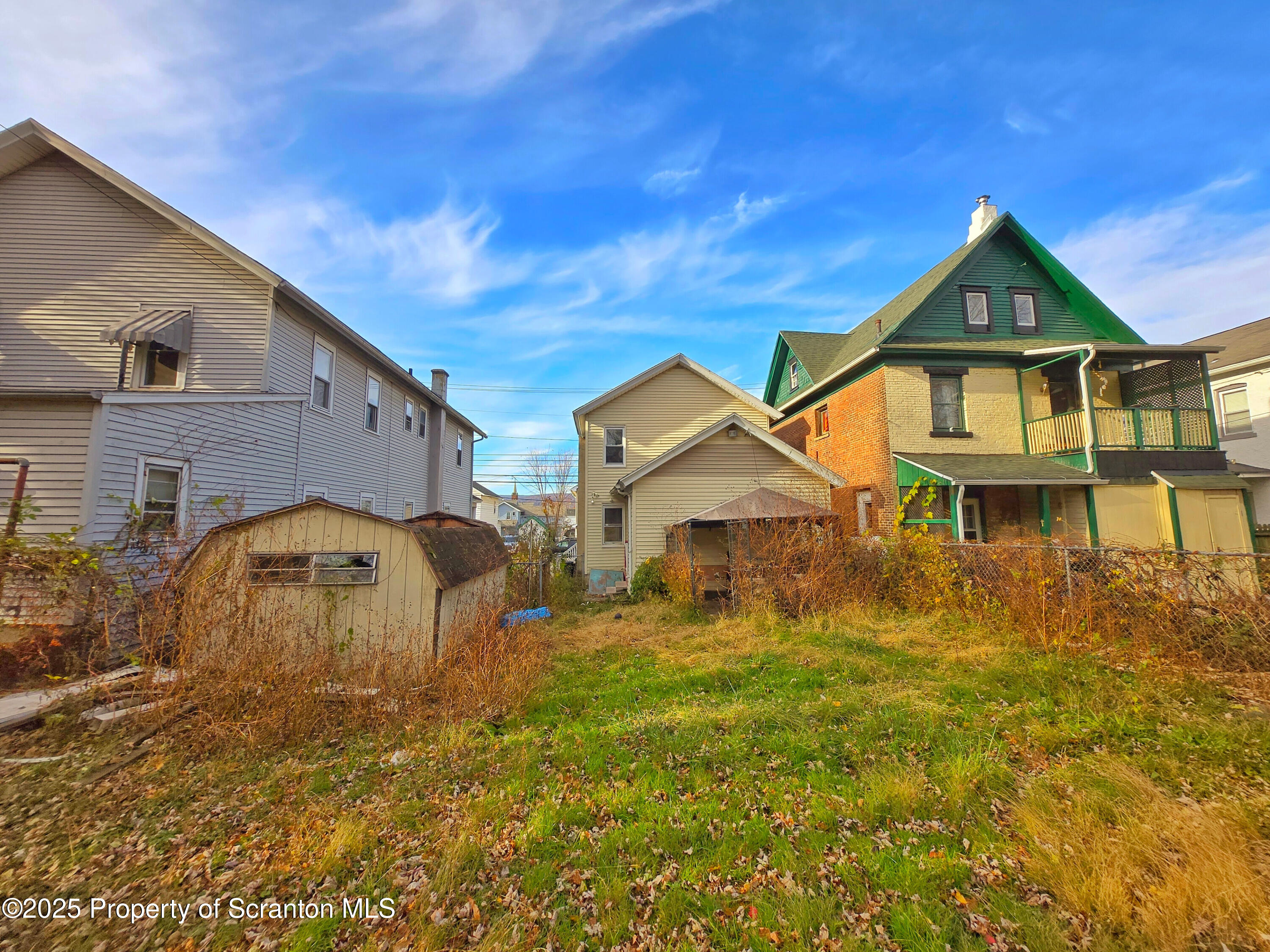 321 Prospect Avenue Scranton, PA 18505 - Photo 21 of 21 a view of a big house with a big yard and large trees