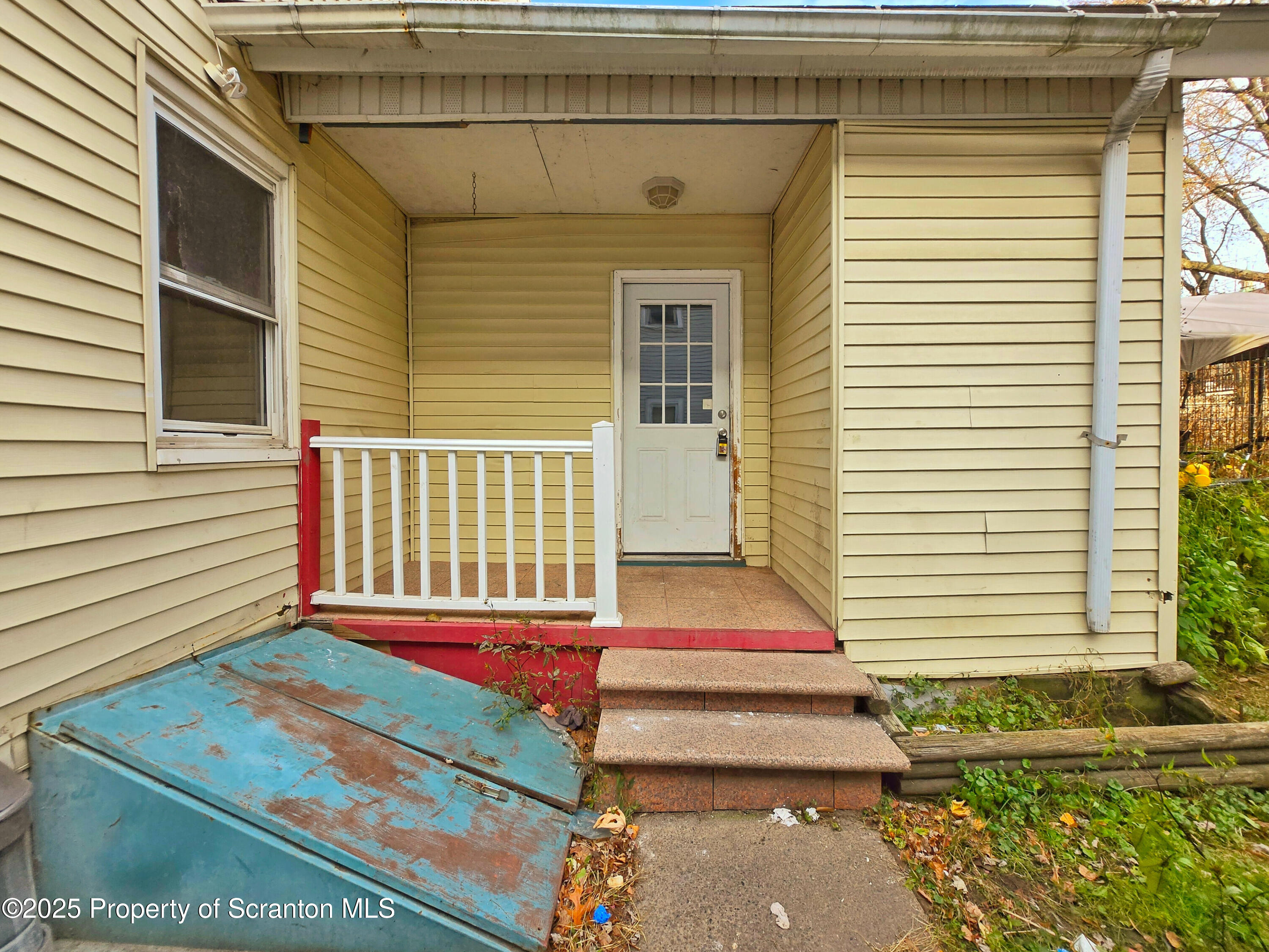 321 Prospect Avenue Scranton, PA 18505 - Photo 4 of 21 a front view of a house with a yard