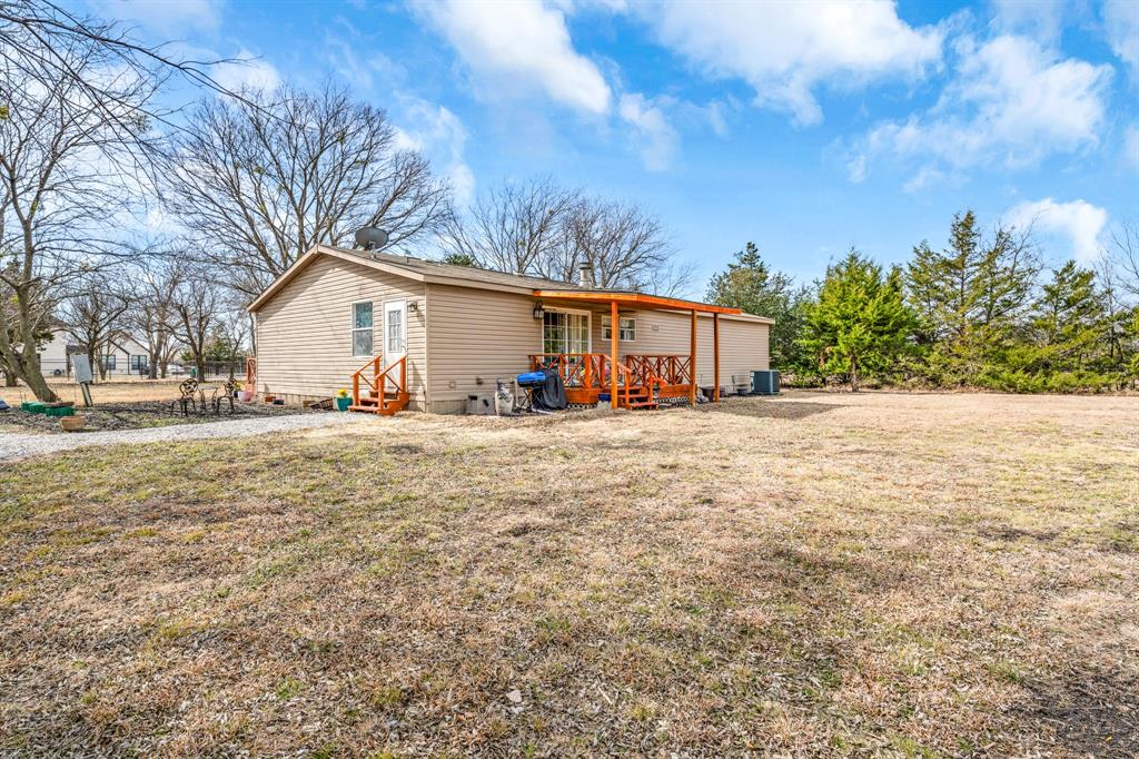 366 Tony Lane Fate, TX 75189 - Photo 28 of 36 a view of large house with a yard