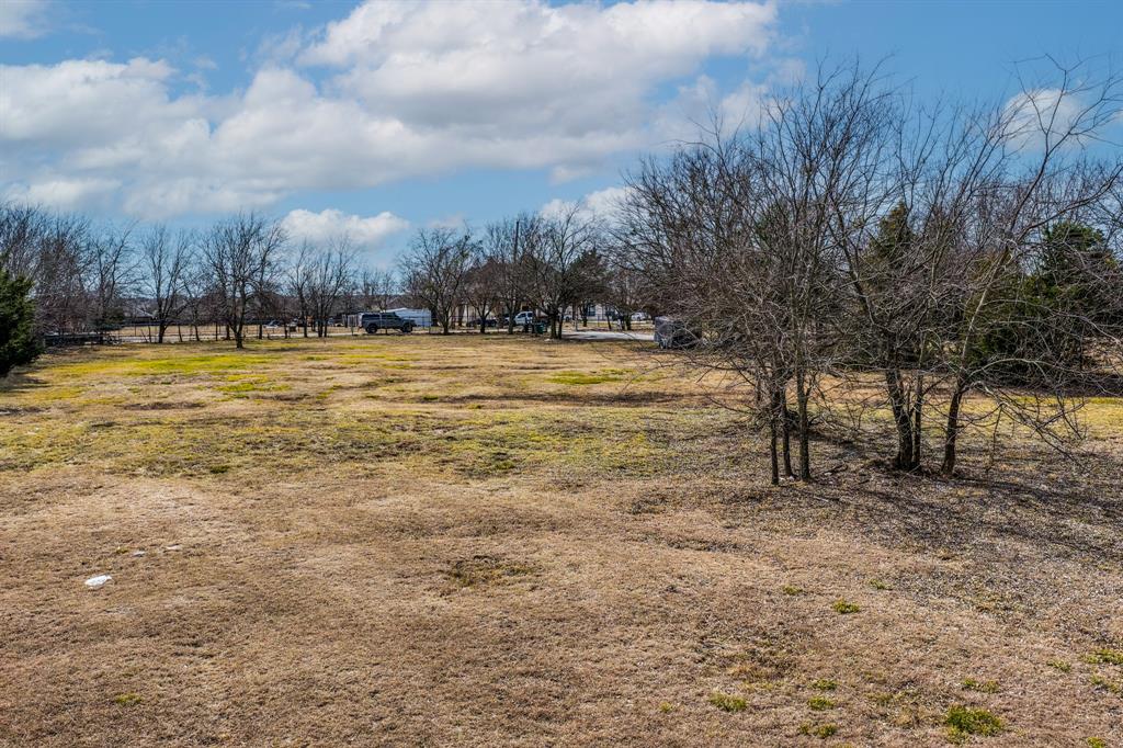 366 Tony Lane Fate, TX 75189 - Photo 34 of 36 a view of a yard with an trees
